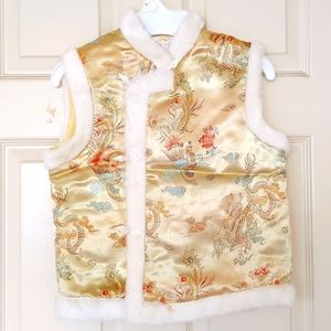 NWOT. Girl's quilted vest trimed with faux fur.